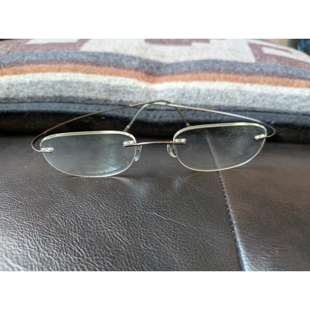 Silhouette Eyeglasses 7799 40 6102 Titan Rimless Frame Austria 49[]19 150